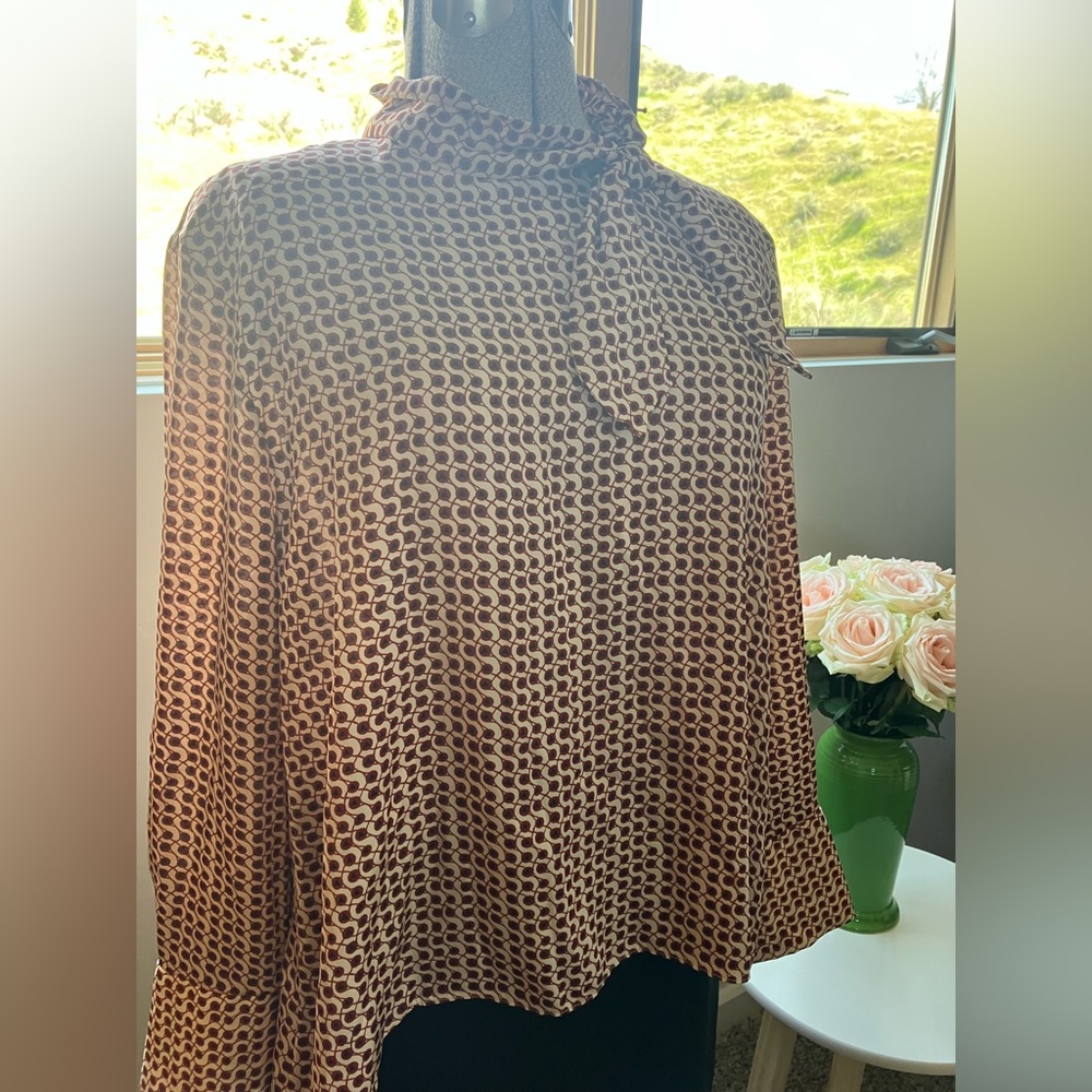 Zara tie neck, high/low hem button back blouse, size L. $18